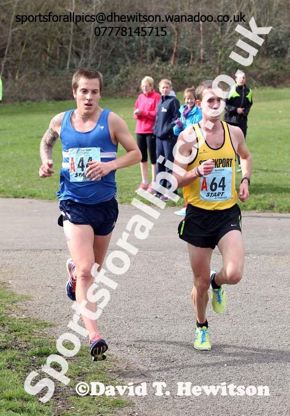 Lewis Timmins (Morpeth) battles with Jack Morris (Stockport) on the the first leg of the 2014 Northern 12 and 6 Stage Relays, Heaton Park, Manchester. Photo: David T. Hewitson/Sports for All Pics
